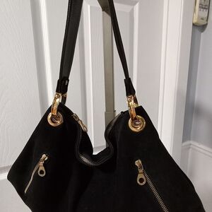 Elegant Black Handbag with Gold Accents